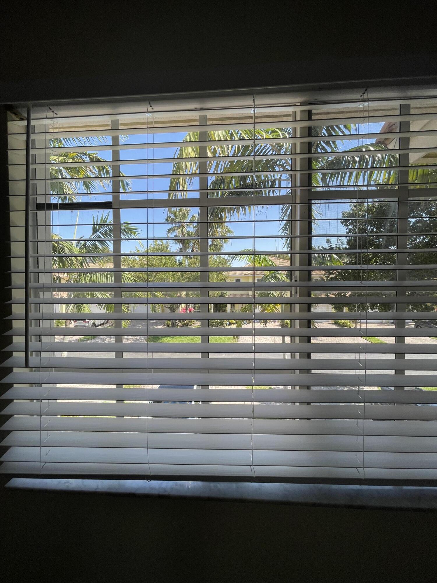 1146 Imperial Lake Road Lake Belvedere Estates, FL 33413 - Photo 19 of 20 a view of a room and window
