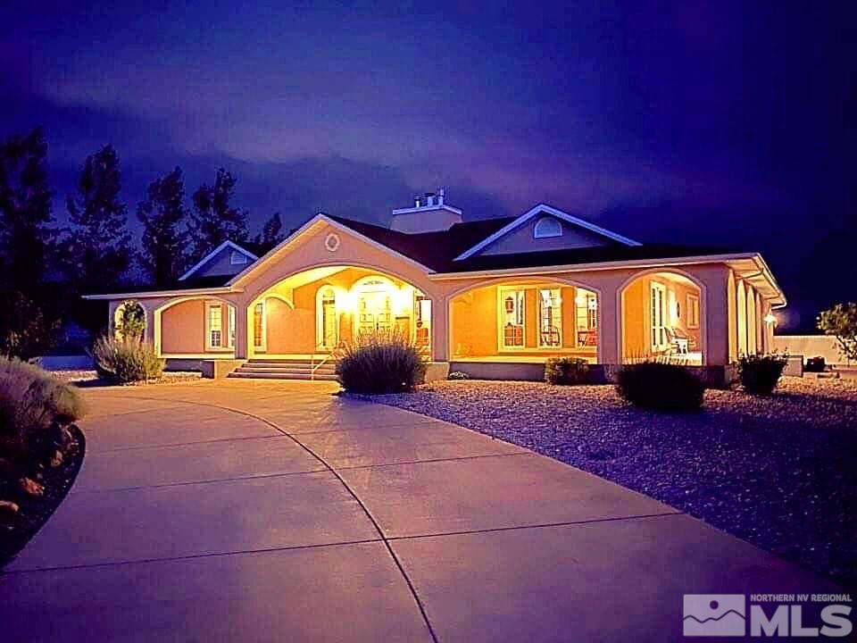 4111 Rancheria Road Fallon, NV 89406 - Photo 1 of 40 a view of a house with a patio