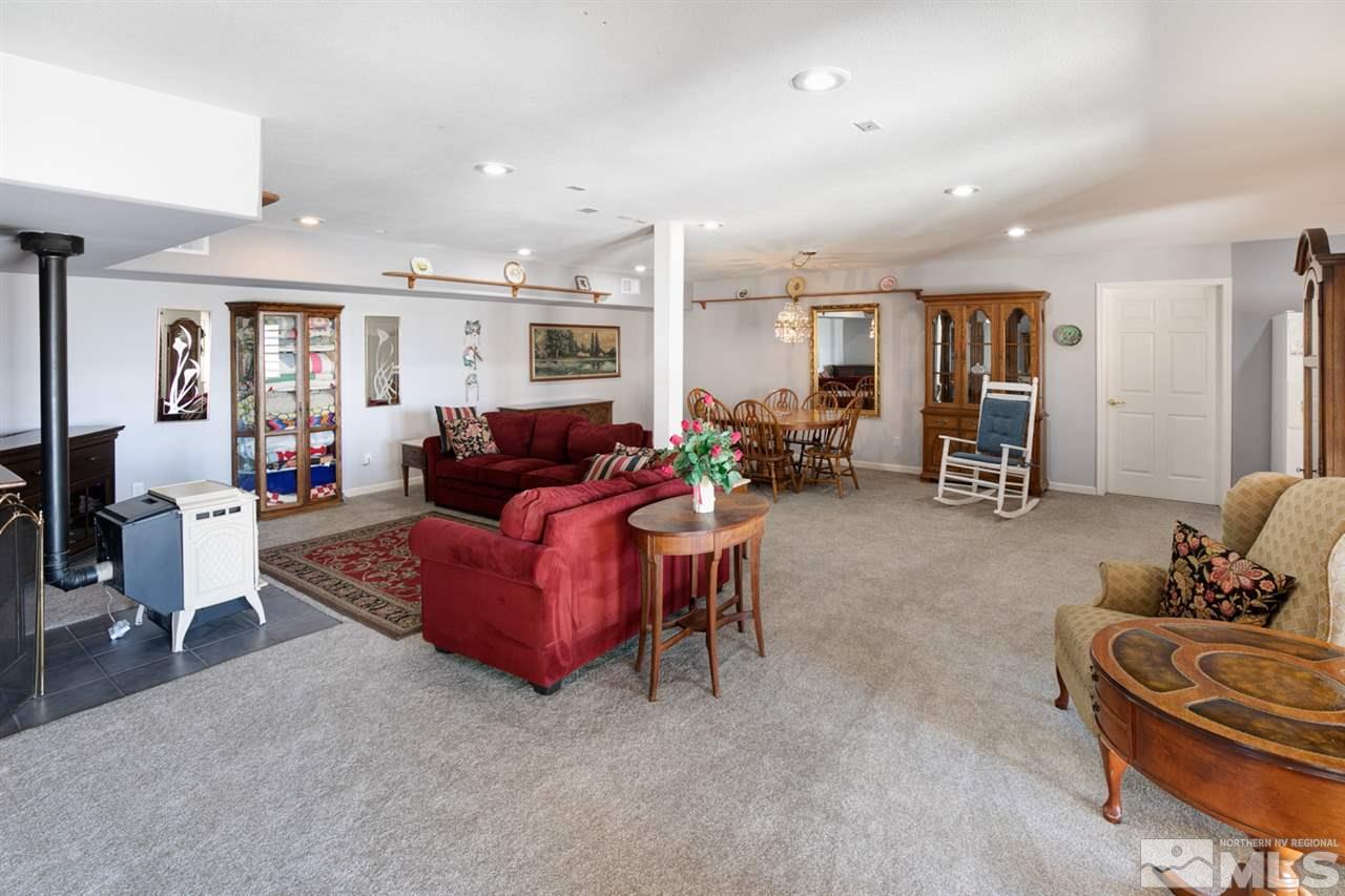 4111 Rancheria Road Fallon, NV 89406 - Photo 23 of 40 a living room with furniture and a large window