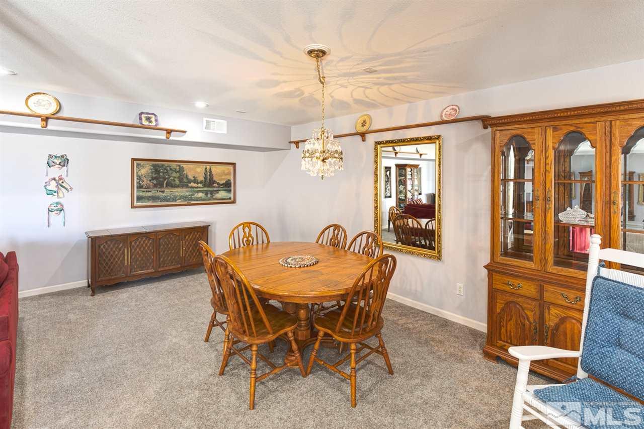 4111 Rancheria Road Fallon, NV 89406 - Photo 25 of 40 a dining room with furniture and window