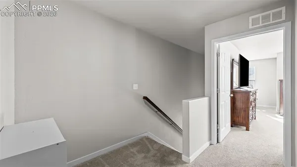 a view of way to rooms