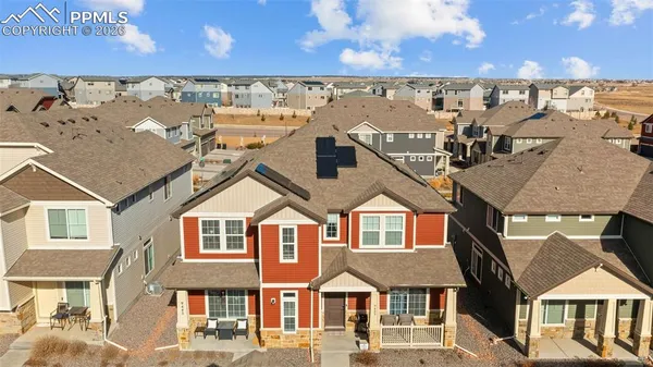 a view of a city with a building in the background