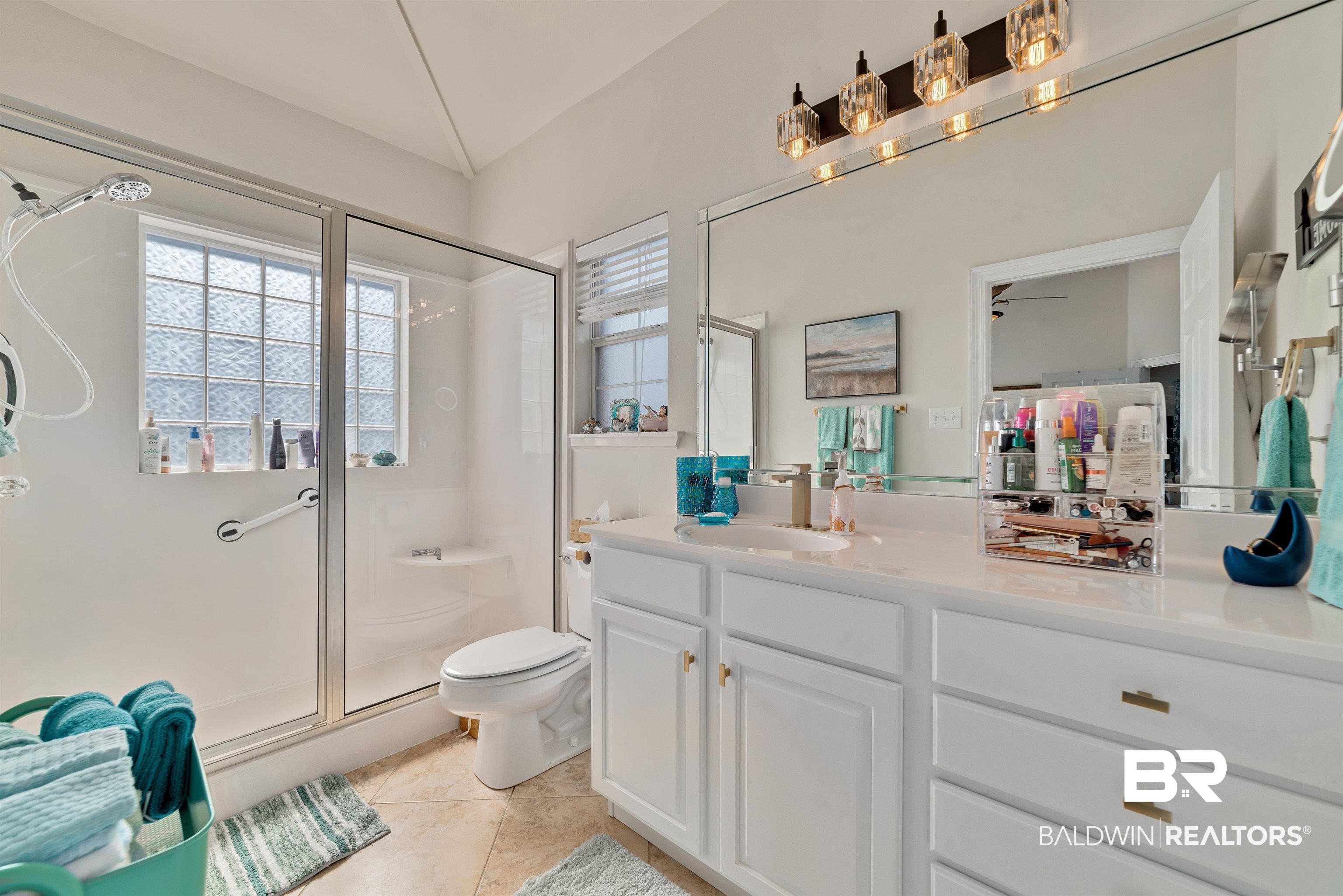 218 Hemingway Loop Foley, AL 36535 - Photo 19 of 39 Full bathroom with a stall shower, vanity, and tile patterned floors