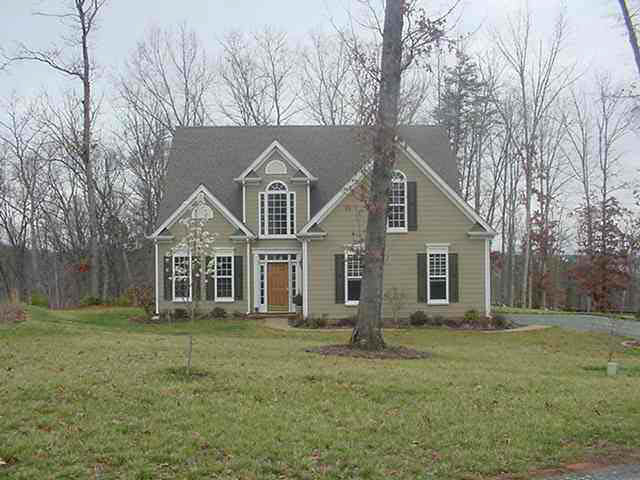 300 Starcrest Road Charlottesville, VA 22902 - Photo 1 of 4 a front view of a house with a yard