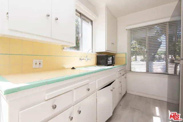 a bathroom with a sink and a bathtub