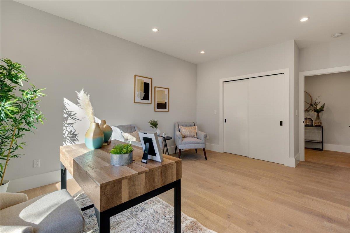 1472 South Wolfe Road Sunnyvale, CA 94087 - Photo 27 of 47 a living room with furniture and wooden floor