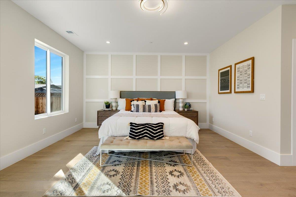 1472 South Wolfe Road Sunnyvale, CA 94087 - Photo 30 of 47 a bedroom with a large bed and a window