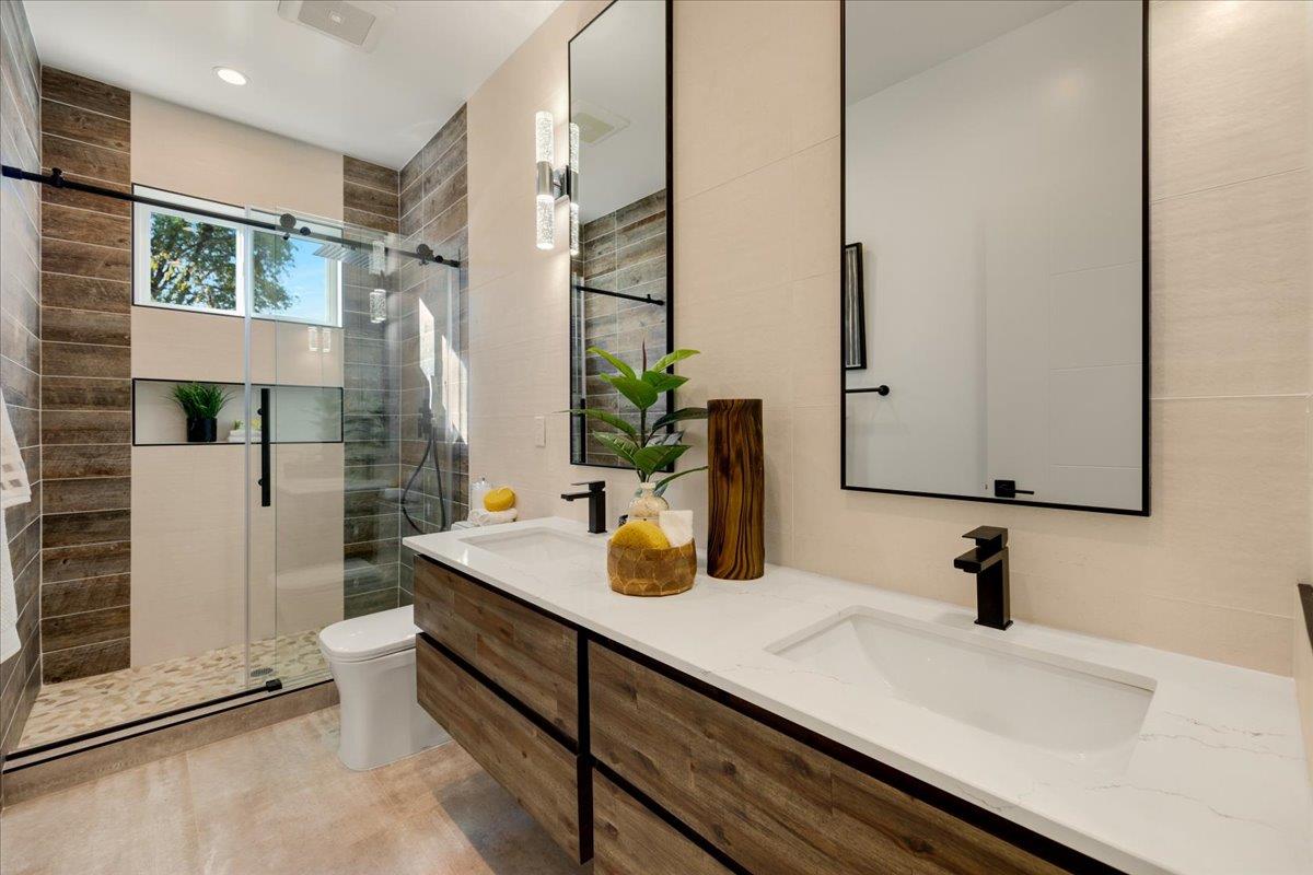 1472 South Wolfe Road Sunnyvale, CA 94087 - Photo 35 of 47 a bathroom with a sink and a mirror