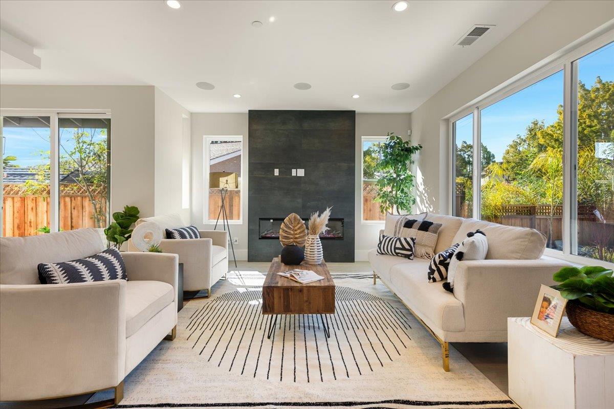 1472 South Wolfe Road Sunnyvale, CA 94087 - Photo 6 of 47 a living room with furniture and a large window