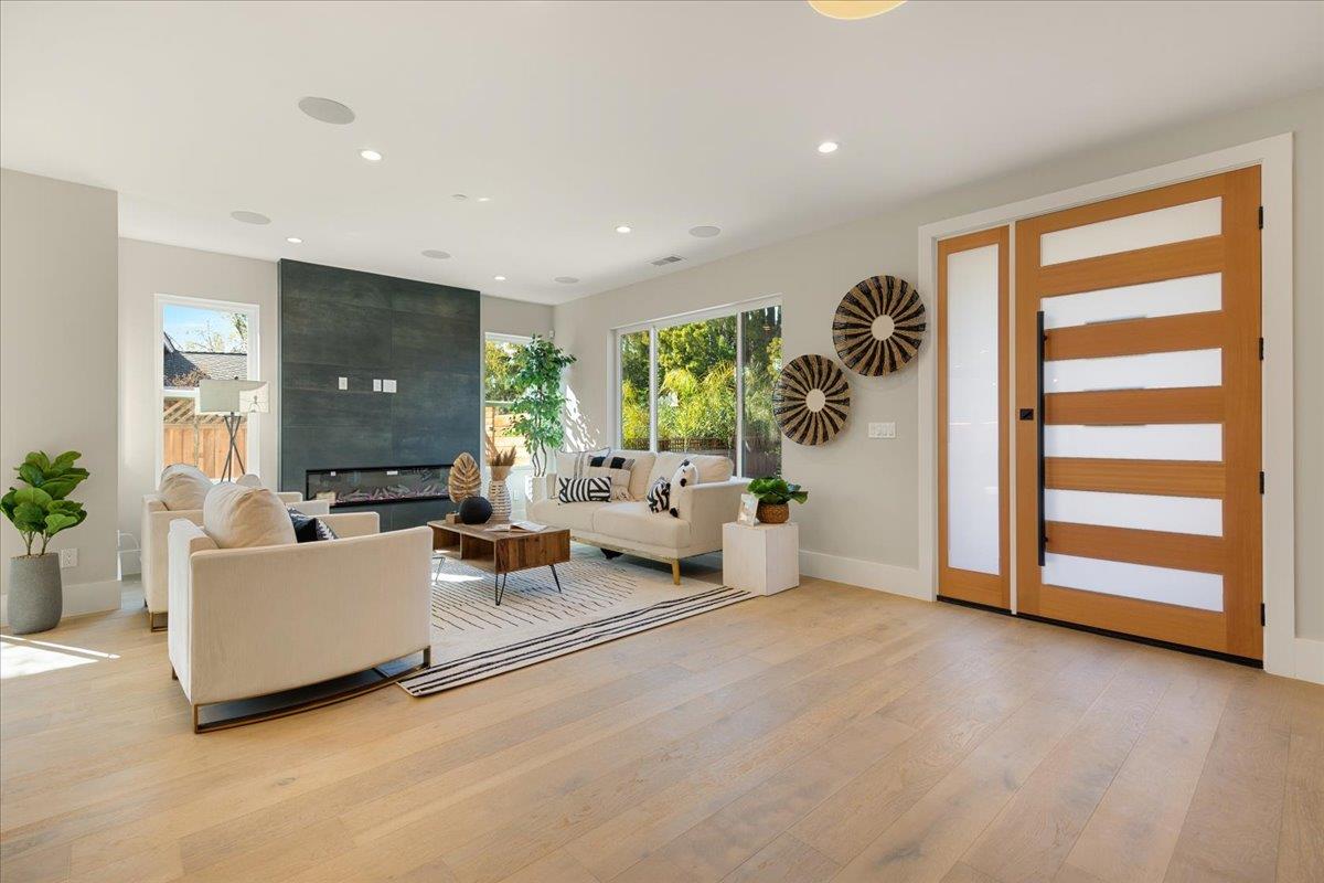 1472 South Wolfe Road Sunnyvale, CA 94087 - Photo 7 of 47 a living room with furniture and a large window