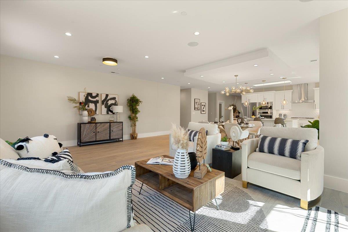 1472 South Wolfe Road Sunnyvale, CA 94087 - Photo 8 of 47 a living room with furniture and kitchen view