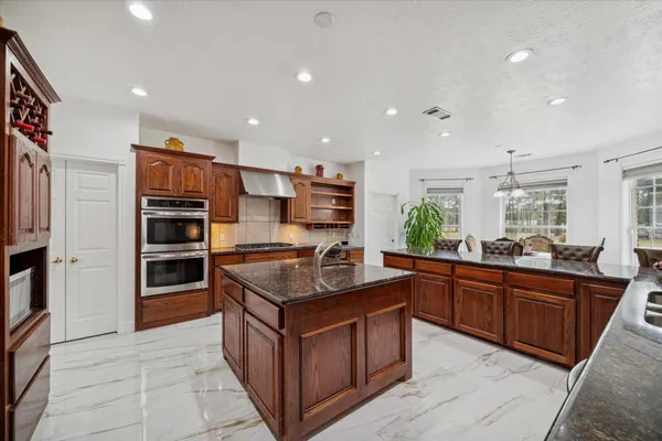 $890,000 | 21992 Blazing Trail, New Caney, TX 77357