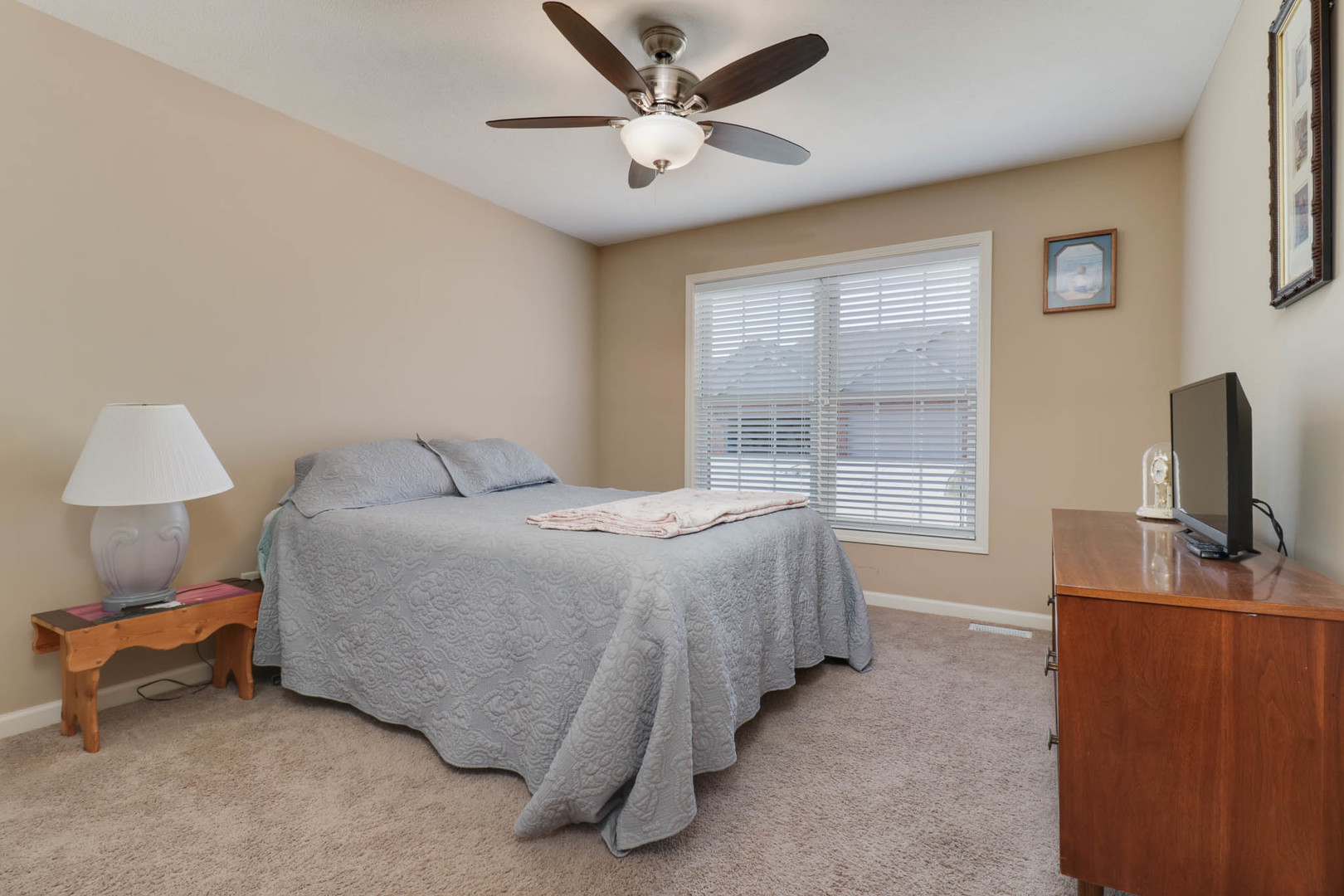 1770 Lockspur Way, Unit 1770 Normal, IL 61761 - Photo 26 of 39 a bedroom with a bed and a window