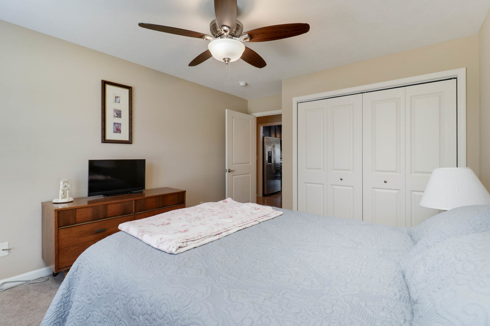 1770 Lockspur Way, Unit 1770 Normal, IL 61761 - Photo 27 of 39 a bed room with a bed and a tv