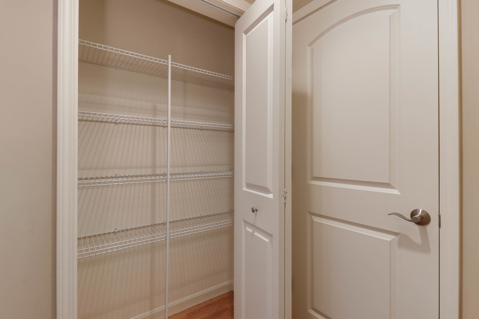 1770 Lockspur Way, Unit 1770 Normal, IL 61761 - Photo 28 of 39 a view of walk in closet with empty racks