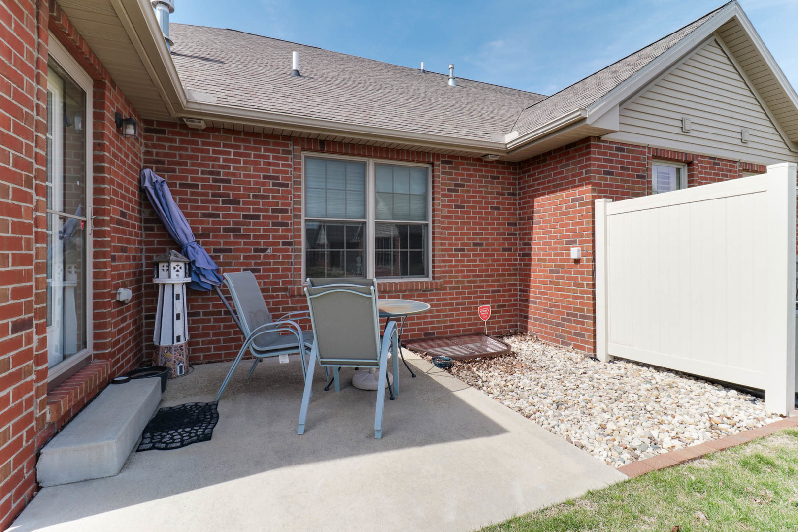 1770 Lockspur Way, Unit 1770 Normal, IL 61761 - Photo 34 of 39 a patio with table and chairs