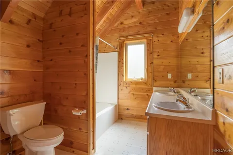 a bathroom with a sink and toilet