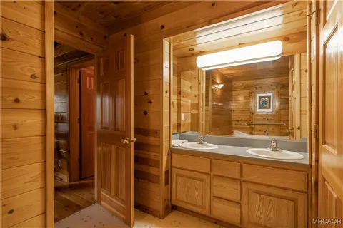 a bathroom with a shower and a sink