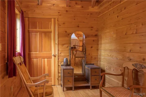 a front view of a house with outdoor seating