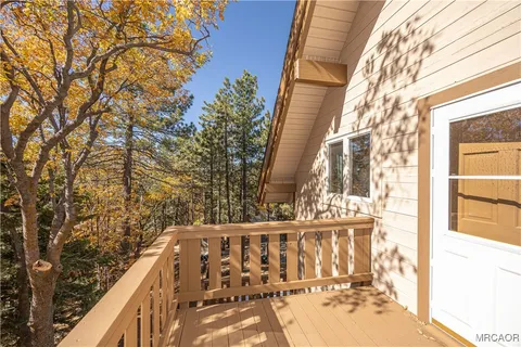 a view of a house with a tree