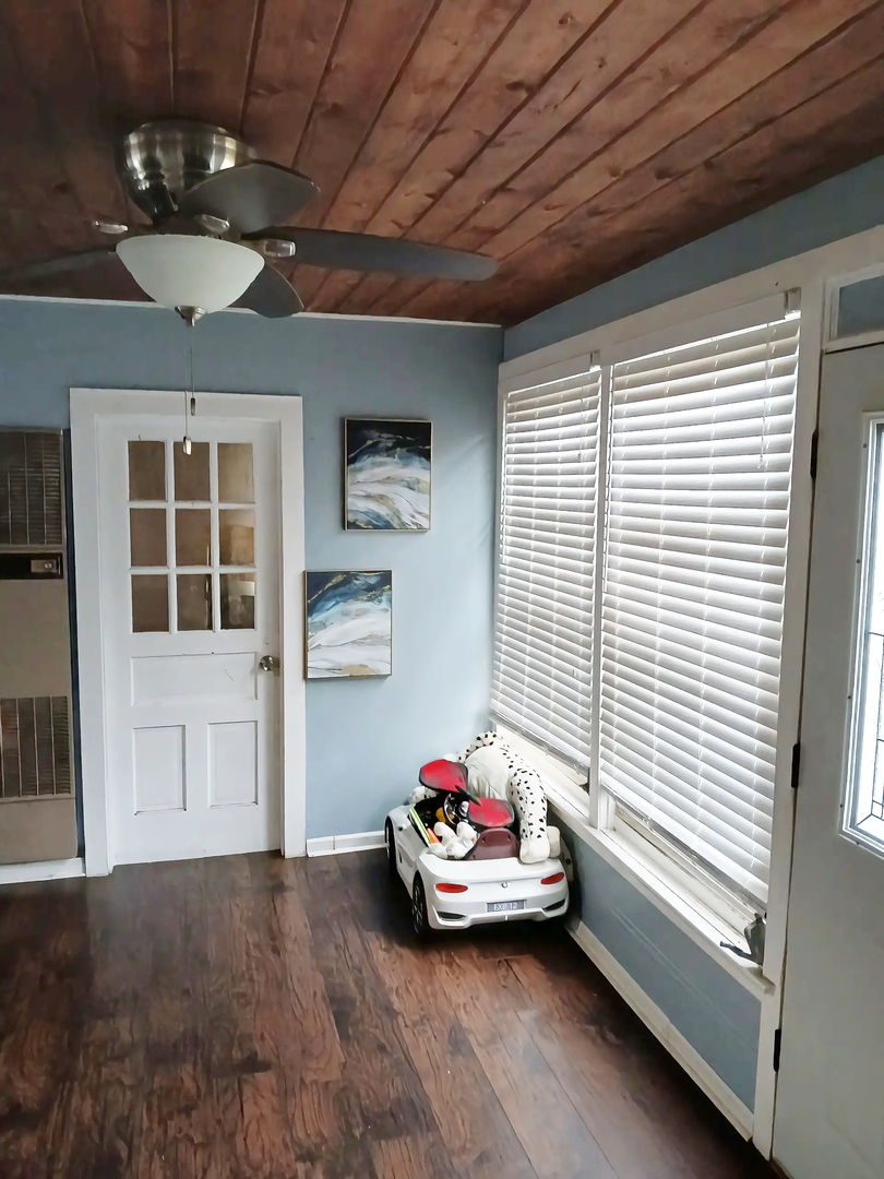 18404 Perth Avenue Homewood, IL 60430 - Photo 10 of 11 a room with furniture and window