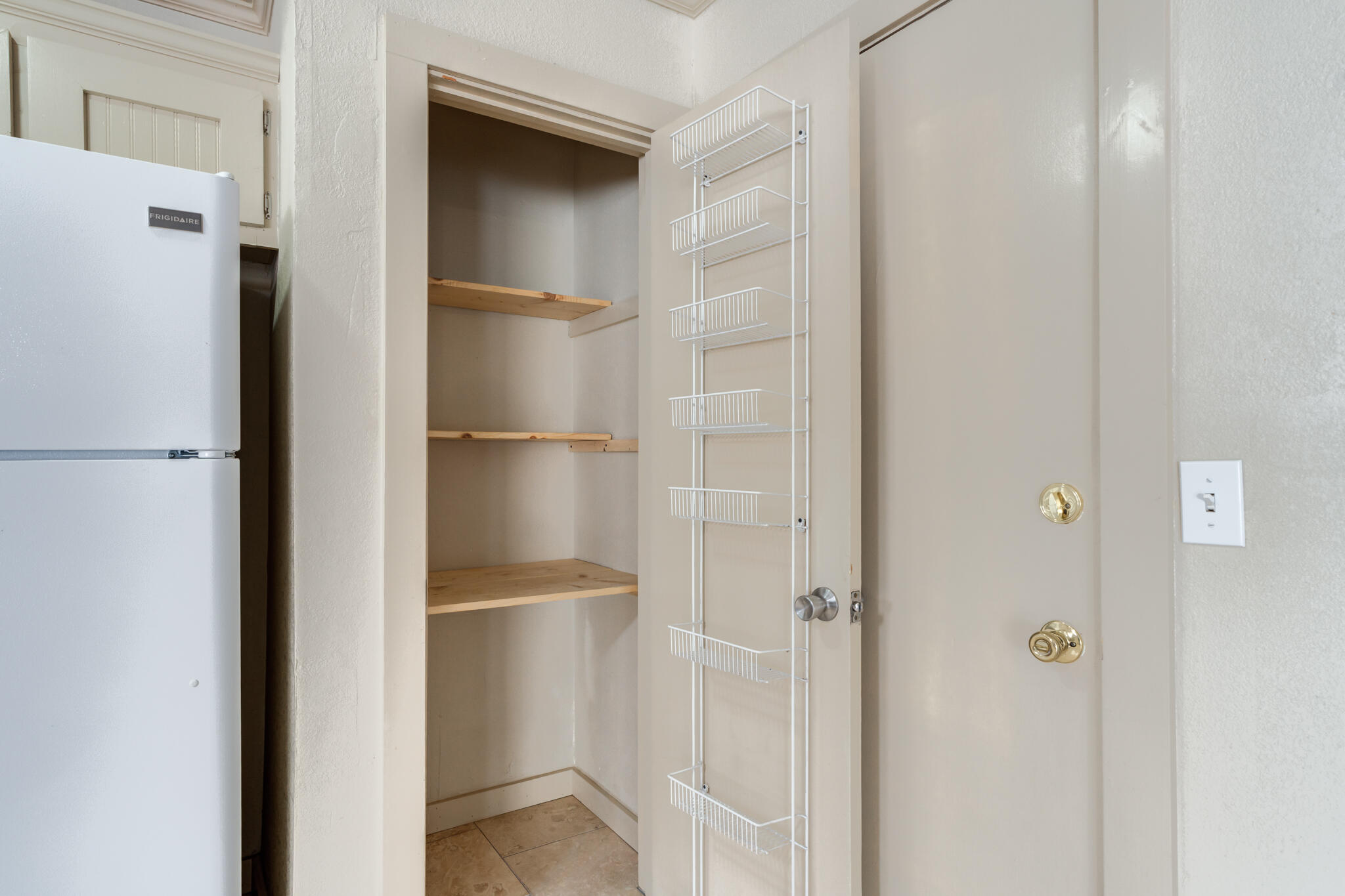 3517 47th Street Lubbock, TX 79413 - Photo 12 of 36 a bathroom with a glass shower door