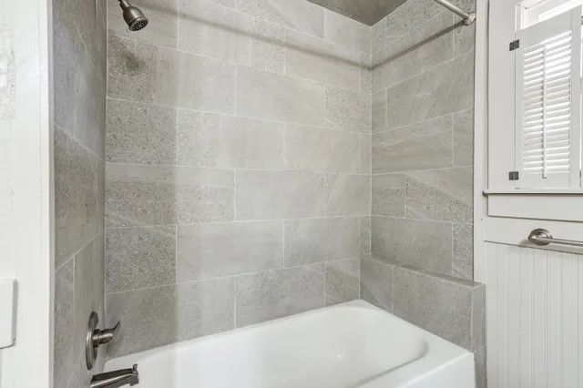 a bathroom with a bathtub