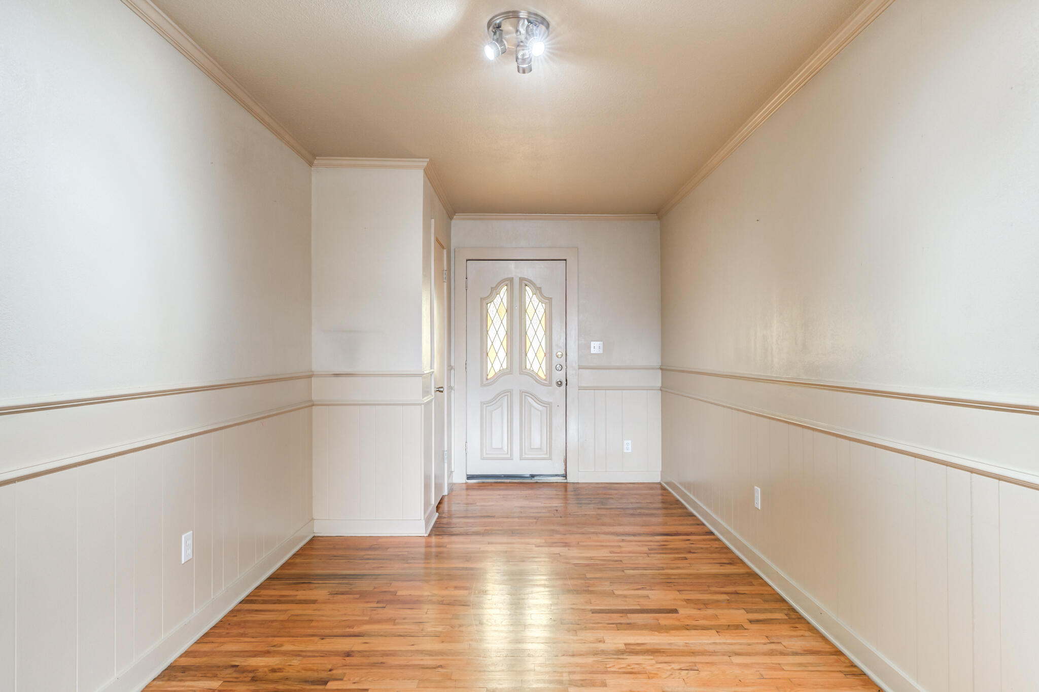 3517 47th Street Lubbock, TX 79413 - Photo 5 of 36 a view of empty room with wooden floor