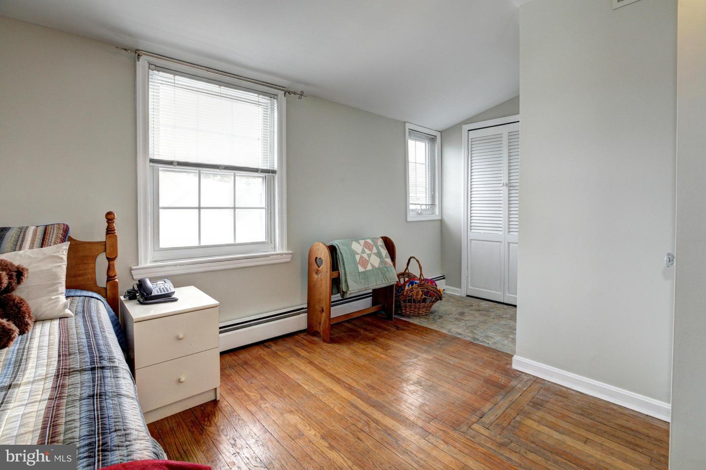 10009 Sutherland Road Silver Spring, MD 20901 - Photo 17 of 27 a living room with furniture and wooden floor