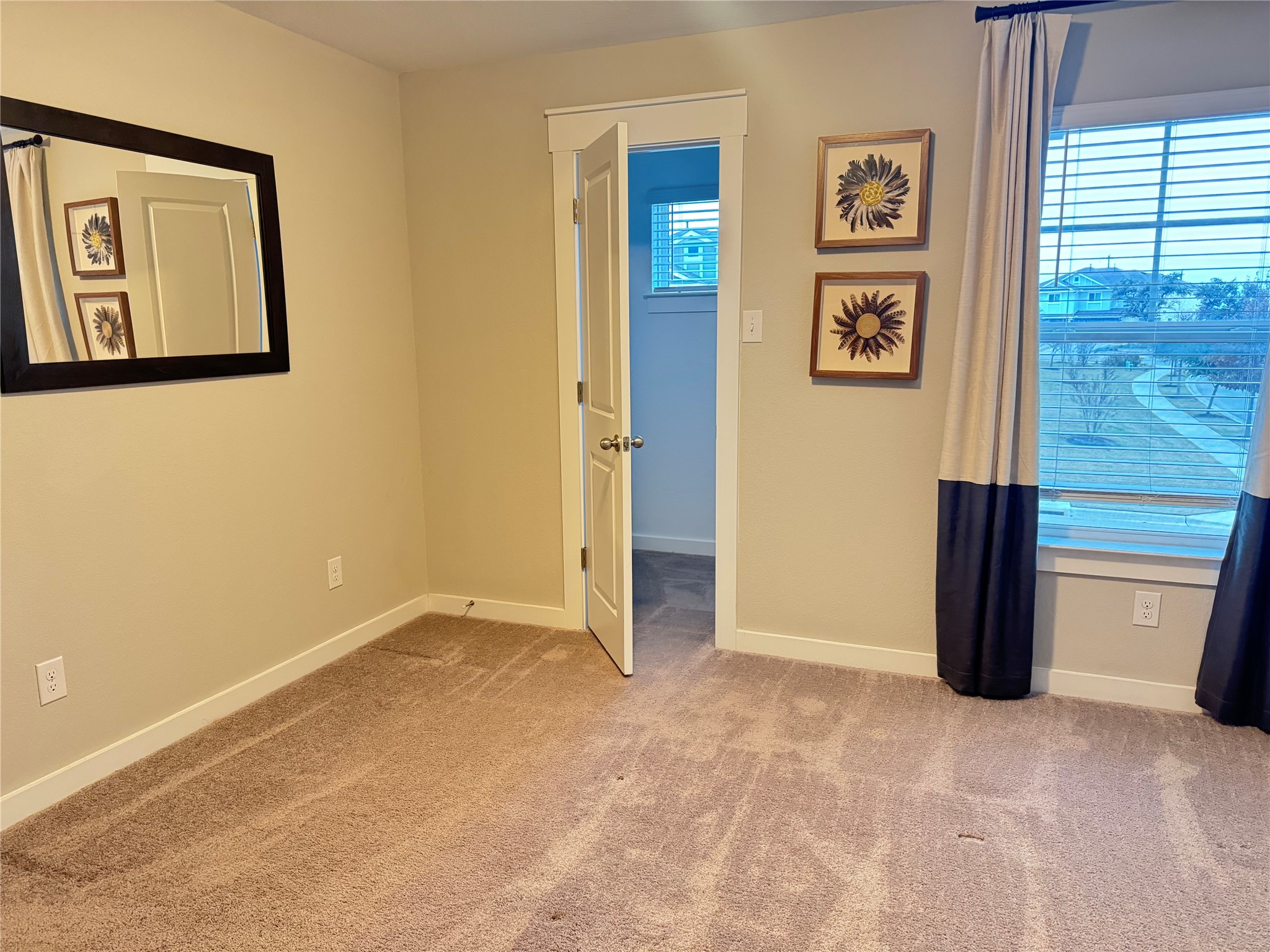 2328 Calvert Drive Leander, TX 78641 - Photo 8 of 17 a view of an empty room with a window