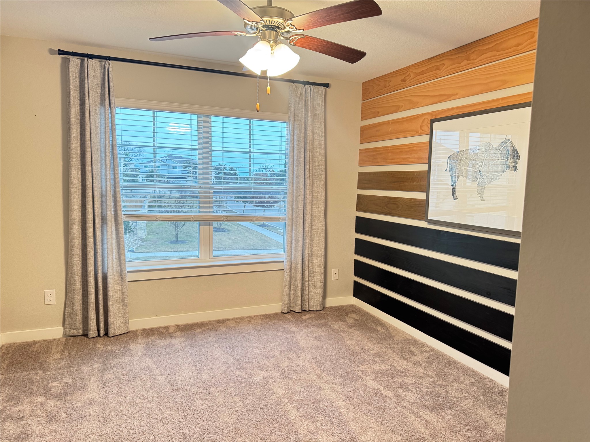 2328 Calvert Drive Leander, TX 78641 - Photo 10 of 17 a view of room with a ceiling fan and a window