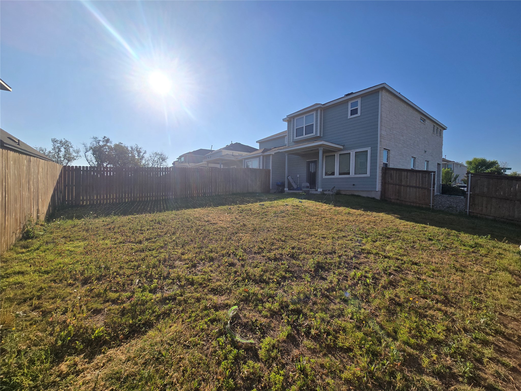 2328 Calvert Drive Leander, TX 78641 - Photo 13 of 17 a view of a house with a yard