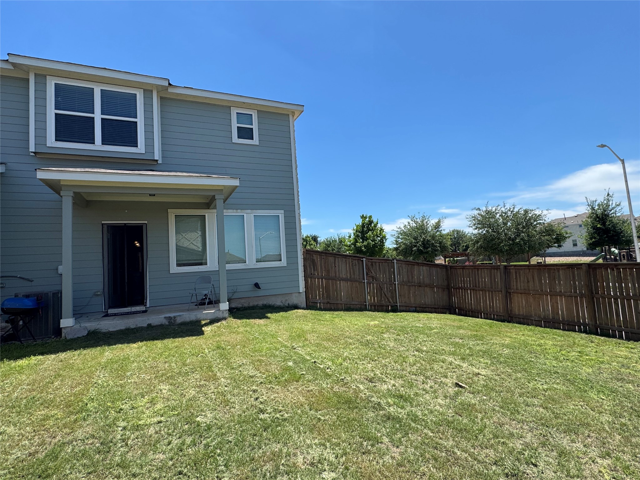 2328 Calvert Drive Leander, TX 78641 - Photo 32 of 35 Expansive backyard featuring a manicured lawn and privacy fencing