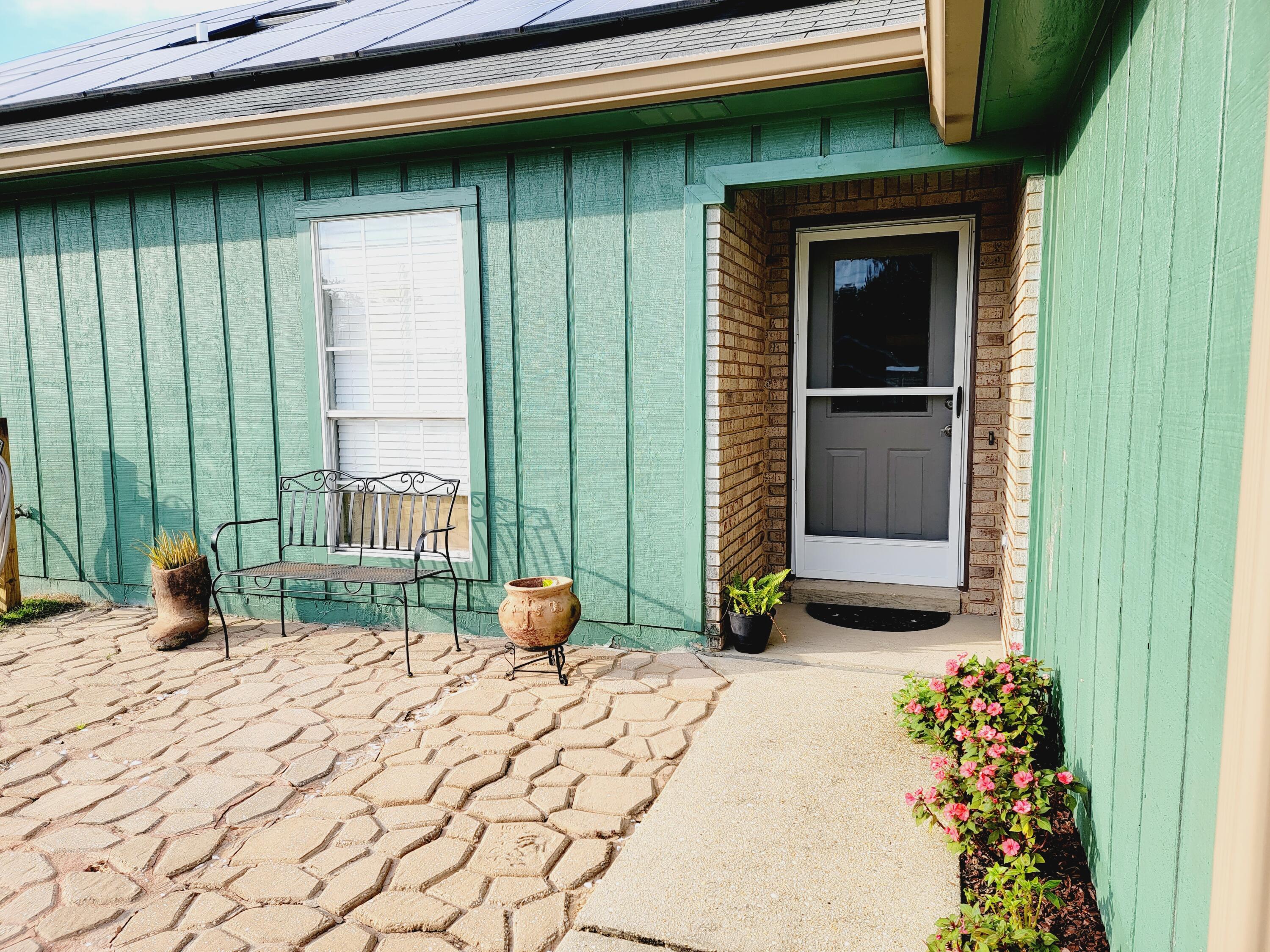 2830 Old Mill Way Crestview, FL 32539 - Photo 1 of 16 a view of outdoor space deck and kitchen