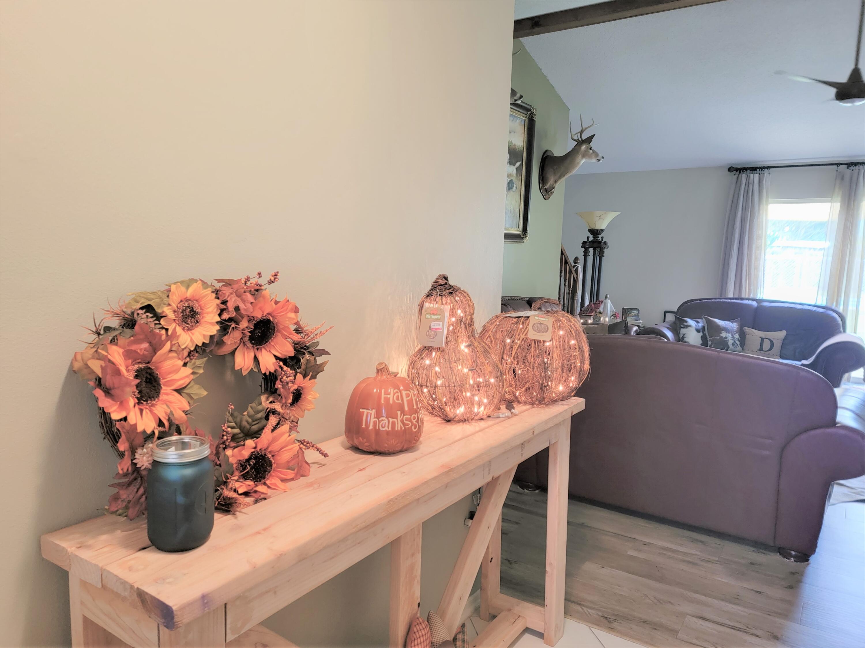 2830 Old Mill Way Crestview, FL 32539 - Photo 2 of 16 a dining room with furniture and wooden floor