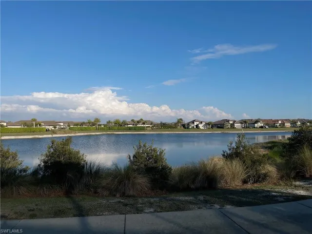 a view of a lake from a yard