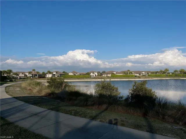 a view of a lake with a city