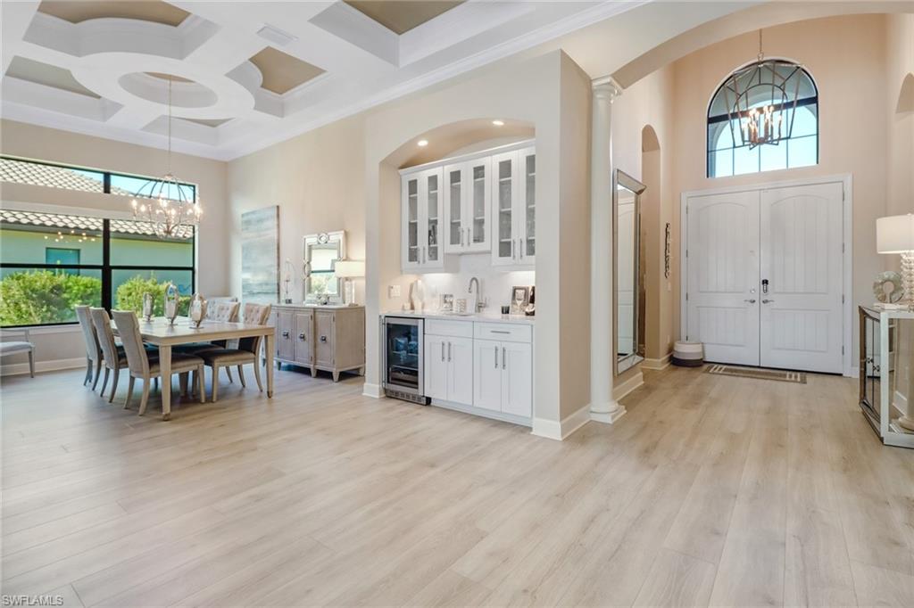 9412 Rapallo Street Naples, FL 34119 - Photo 6 of 34 a view of a livingroom with furniture and window