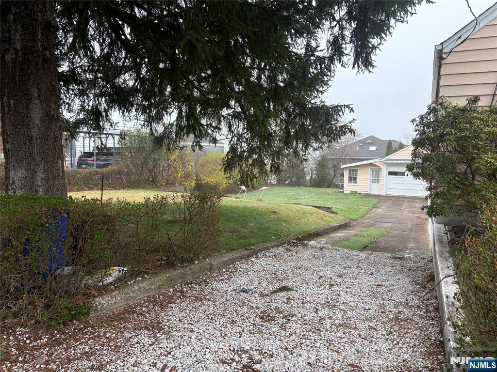 429 MacArthur Avenue Garfield, NJ 07026 - Photo 16 of 38 a view of a yard in front of house with a street