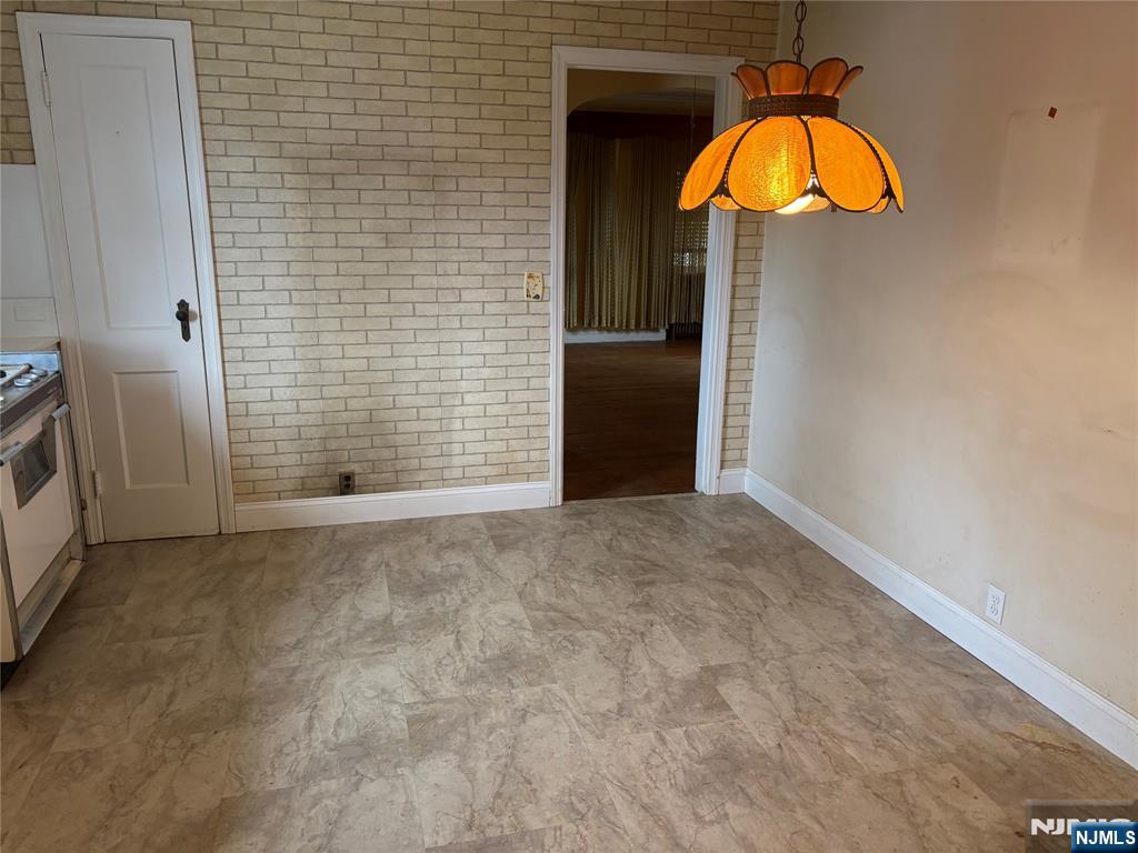 429 MacArthur Avenue Garfield, NJ 07026 - Photo 23 of 38 a view of a livingroom with a fireplace