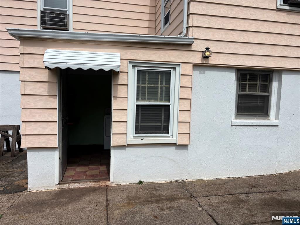 429 MacArthur Avenue Garfield, NJ 07026 - Photo 4 of 38 a front view of a house