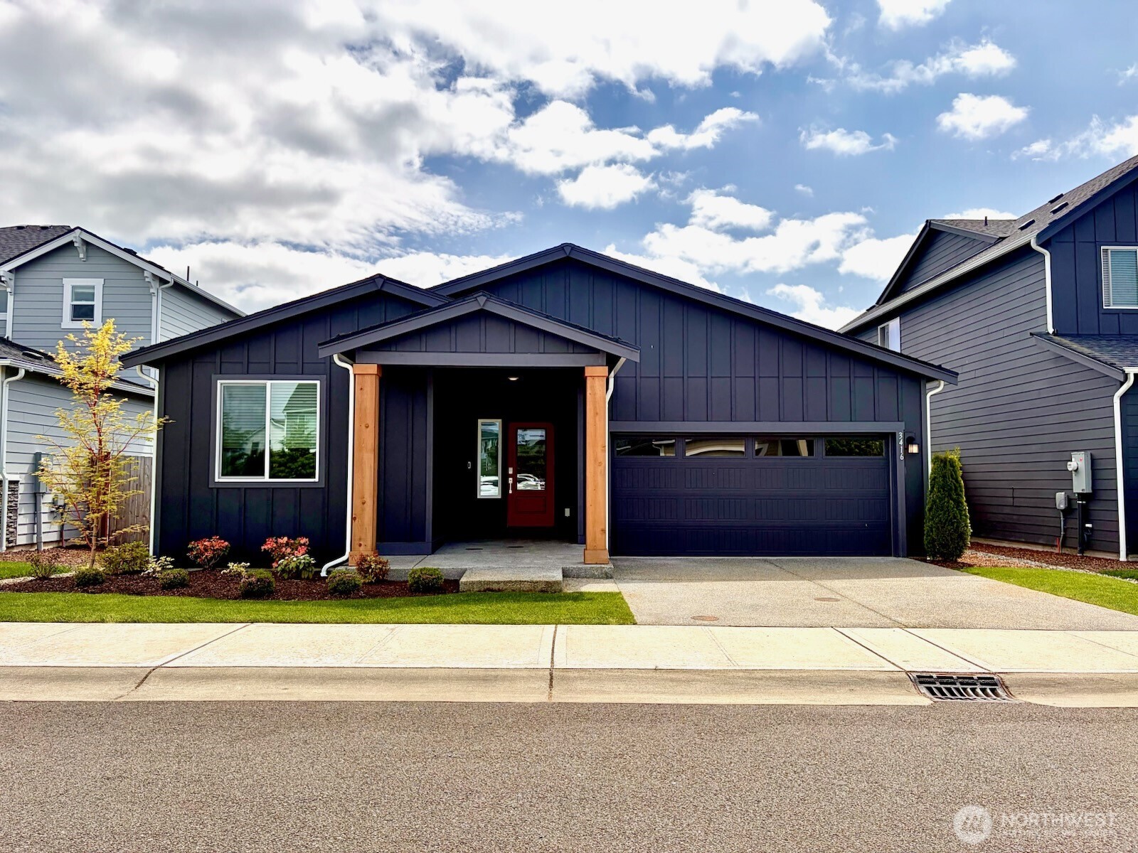 3416 Bittern Lane Port Orchard, WA 98367 - Photo 1 of 28 a view of a house with a yard and potted plants