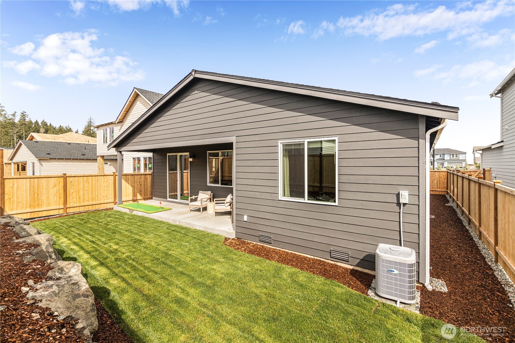 3416 Bittern Lane Port Orchard, WA 98367 - Photo 27 of 28 a view of a house with backyard and sitting area