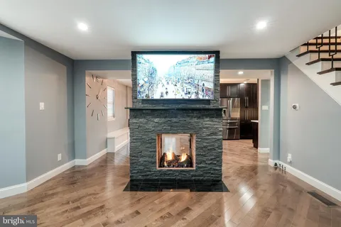 a room with fireplace and a fireplace