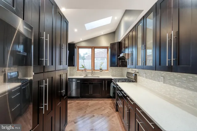 a large kitchen with a large counter top