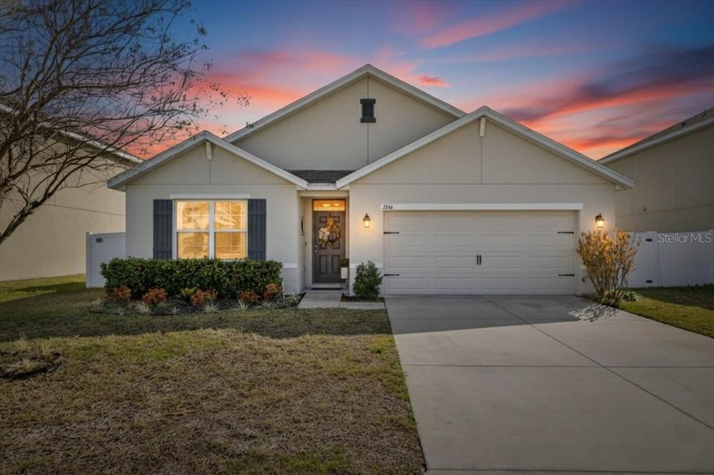 3246 South Northview Road Plant City, FL 33566 - Photo 1 of 57 a front view of a house with a yard