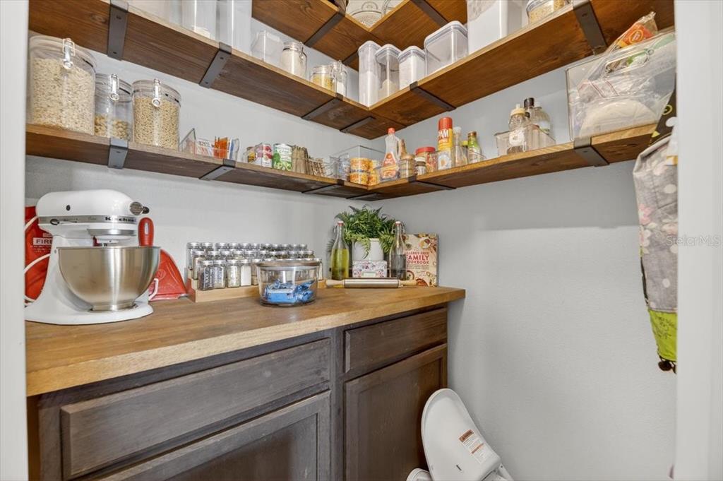 3246 South Northview Road Plant City, FL 33566 - Photo 16 of 57 a kitchen with a refrigerator and a sink