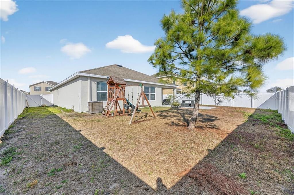 3246 South Northview Road Plant City, FL 33566 - Photo 40 of 57 a view of a house with a patio