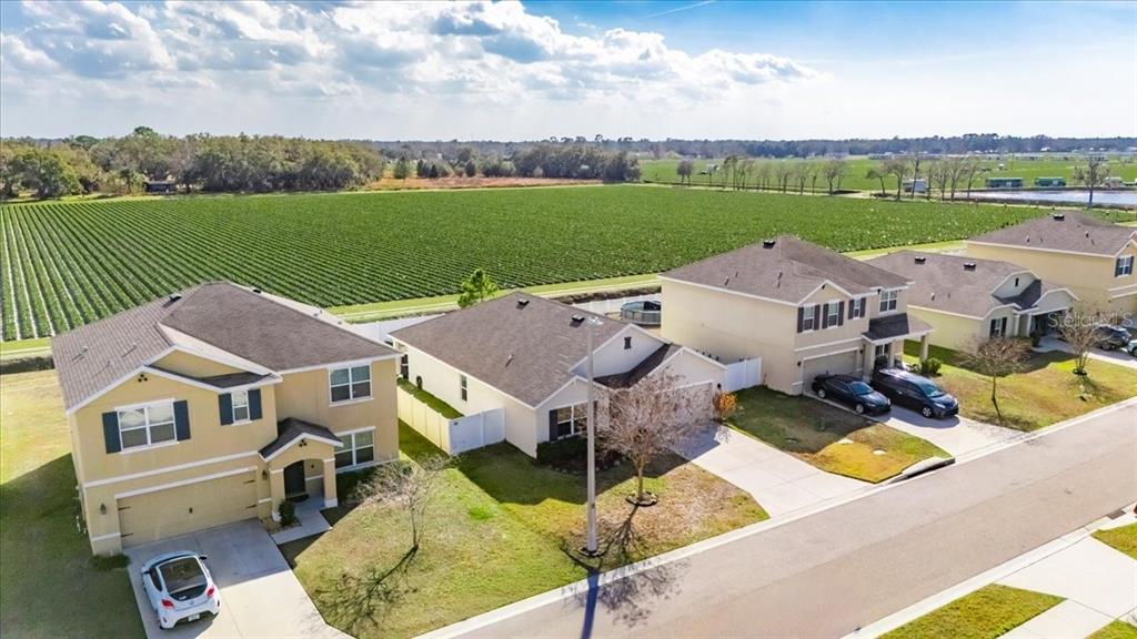 3246 South Northview Road Plant City, FL 33566 - Photo 45 of 57 an aerial view of a house with garden space and ocean view
