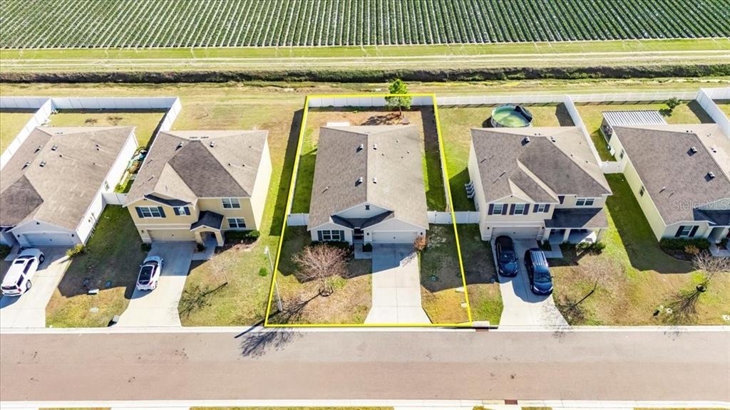 3246 South Northview Road Plant City, FL 33566 - Photo 46 of 57 an aerial view of a house with a swimming pool